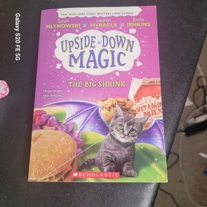 Scholastic Upside-Down Magic - Purple and Red Cover